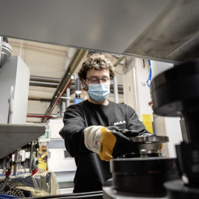 MAN staff at work wearing PPE mask