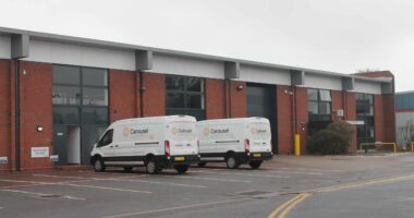 White Van Parked Next To New Birmingham Airport Facility