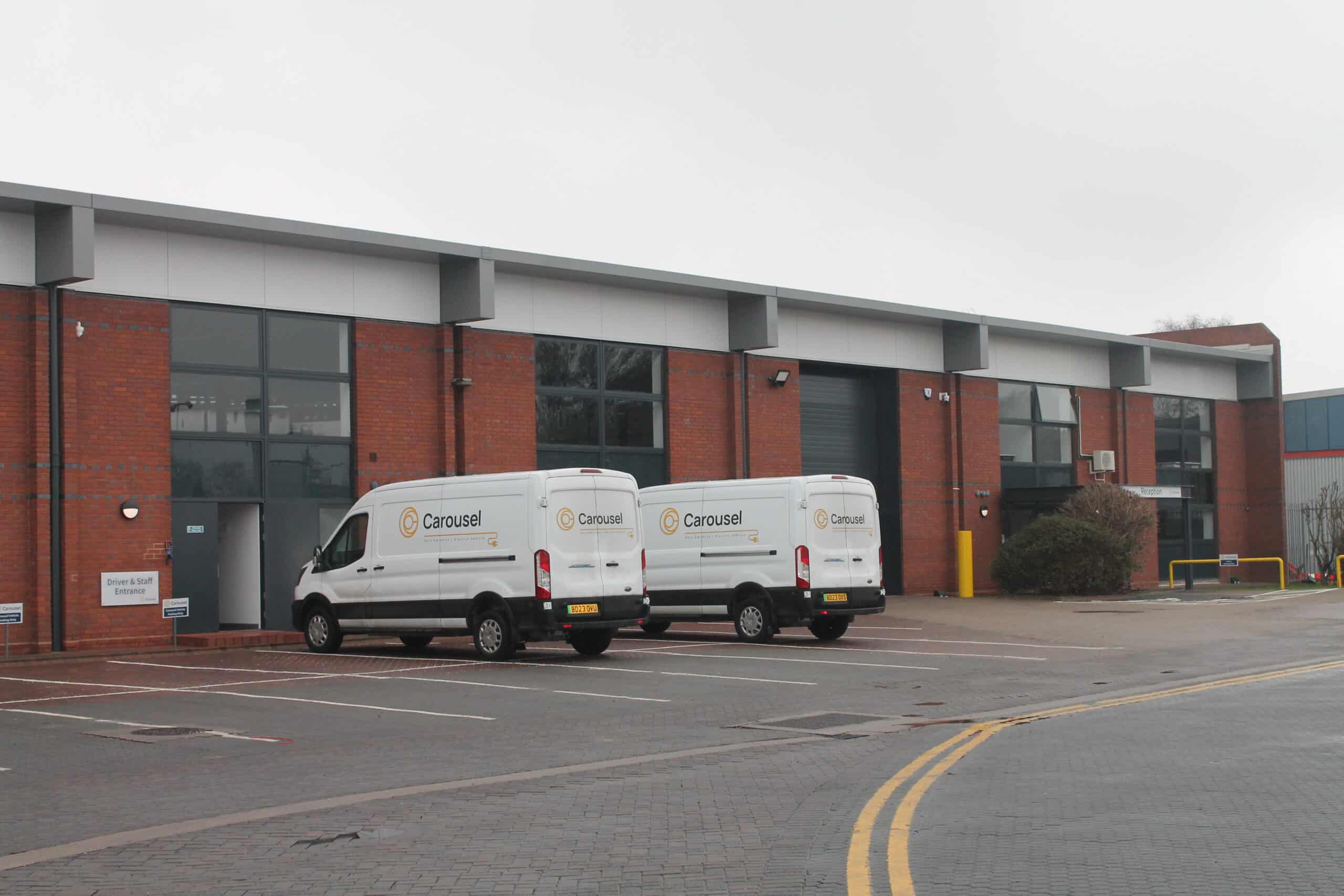 White van parked next to new Birmingham Airport facility