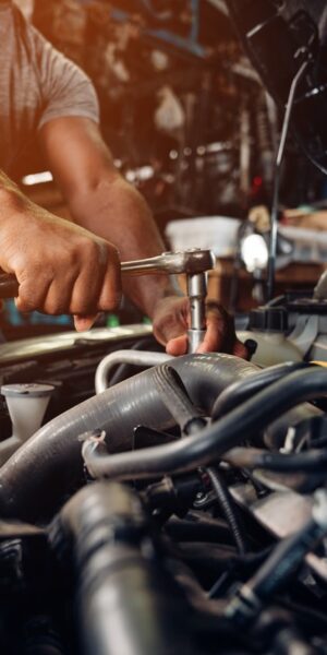 Auto mechanic are repair and maintenance auto engine is problems at car repair shop.